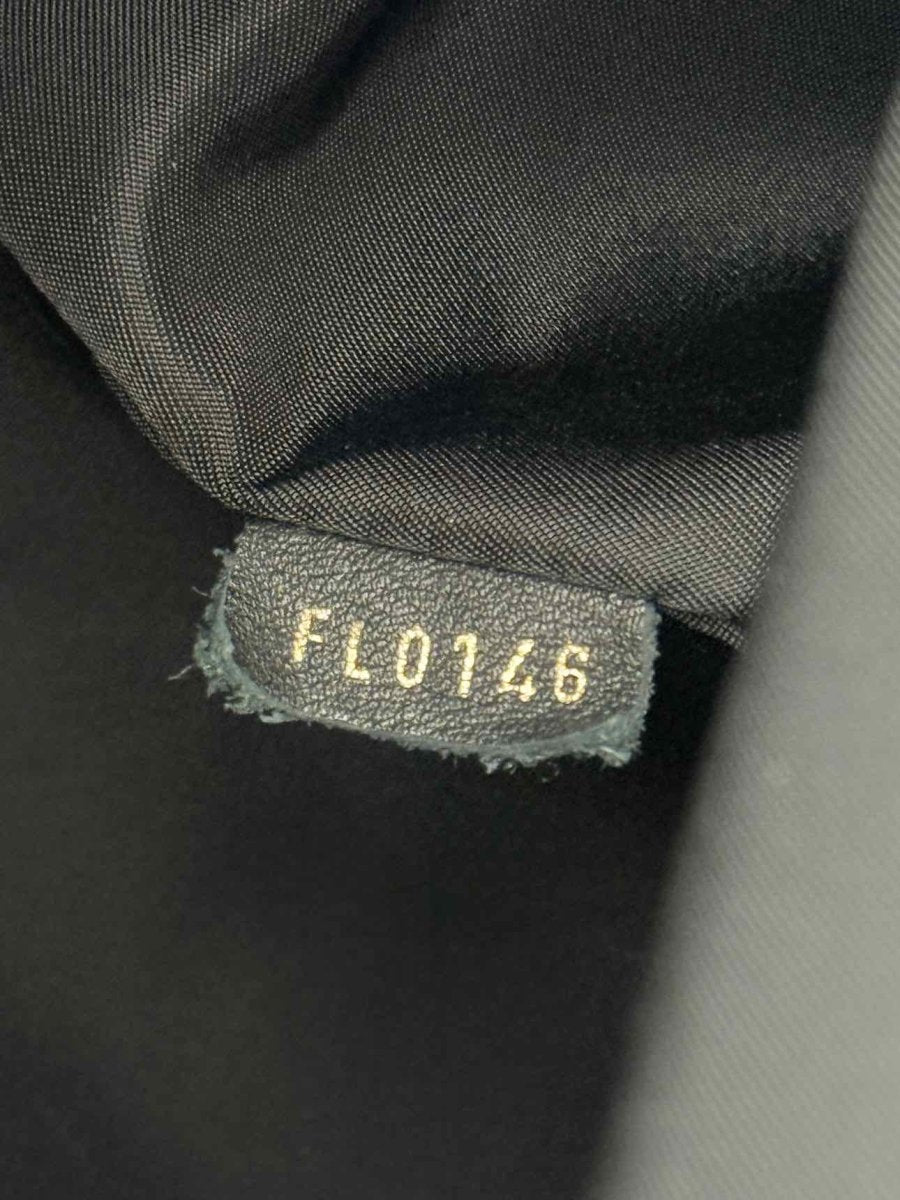 Pre - loved LOUIS VUITTON Palm Springs Brown Monogram Backpack at Reems Closet