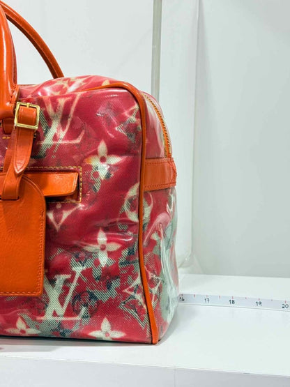 Pre - loved LOUIS VUITTON Richard Prince Orange Monogram Travel Bag at Reems Closet