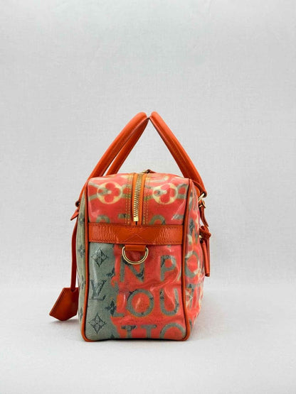 Pre - loved LOUIS VUITTON Richard Prince Orange Monogram Travel Bag at Reems Closet