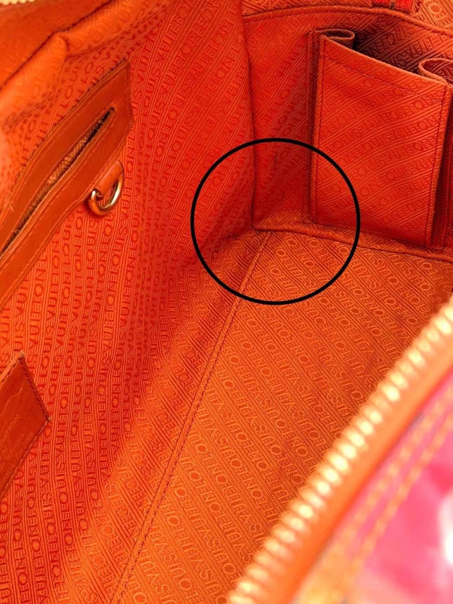 Pre - loved LOUIS VUITTON Richard Prince Orange Monogram Travel Bag at Reems Closet