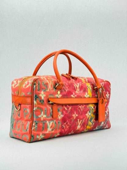 Pre - loved LOUIS VUITTON Richard Prince Orange Monogram Travel Bag at Reems Closet