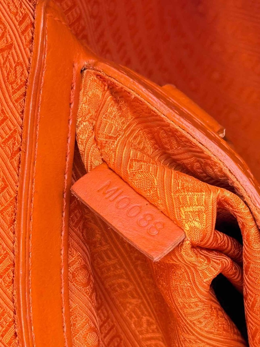 Pre - loved LOUIS VUITTON Richard Prince Orange Monogram Travel Bag at Reems Closet