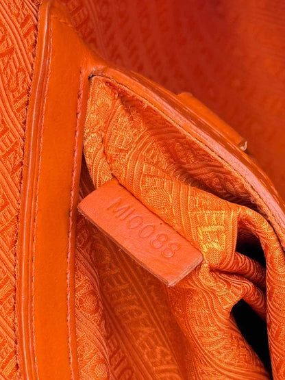 Pre - loved LOUIS VUITTON Richard Prince Orange Monogram Travel Bag at Reems Closet