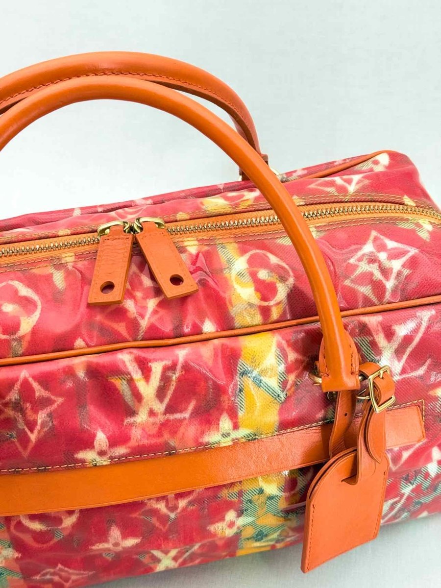 Pre - loved LOUIS VUITTON Richard Prince Orange Monogram Travel Bag at Reems Closet