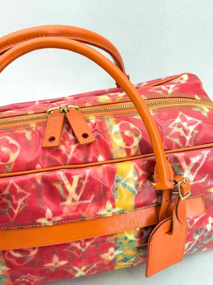Pre - loved LOUIS VUITTON Richard Prince Orange Monogram Travel Bag at Reems Closet