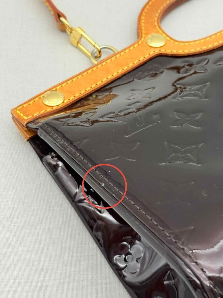 Pre-loved LOUIS VUITTON Roxbury Drive Burgundy Top Handle at Reems Closet