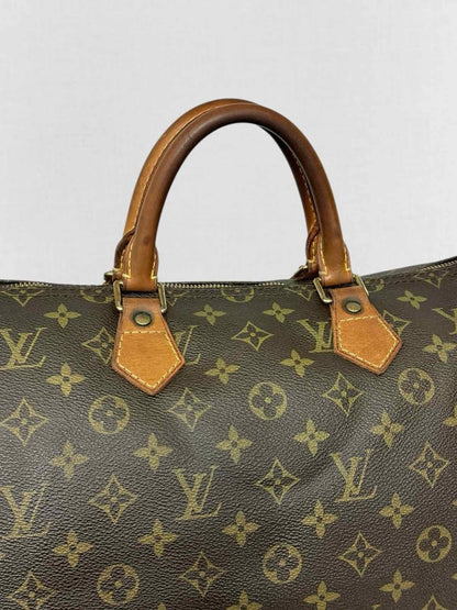 Pre - loved LOUIS VUITTON Speedy 30 Brown Monogram Top Handle at Reems Closet