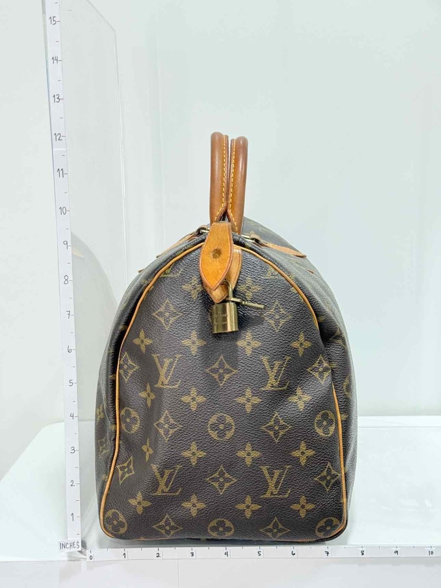 Pre - loved LOUIS VUITTON Speedy 30 Brown Monogram Top Handle at Reems Closet