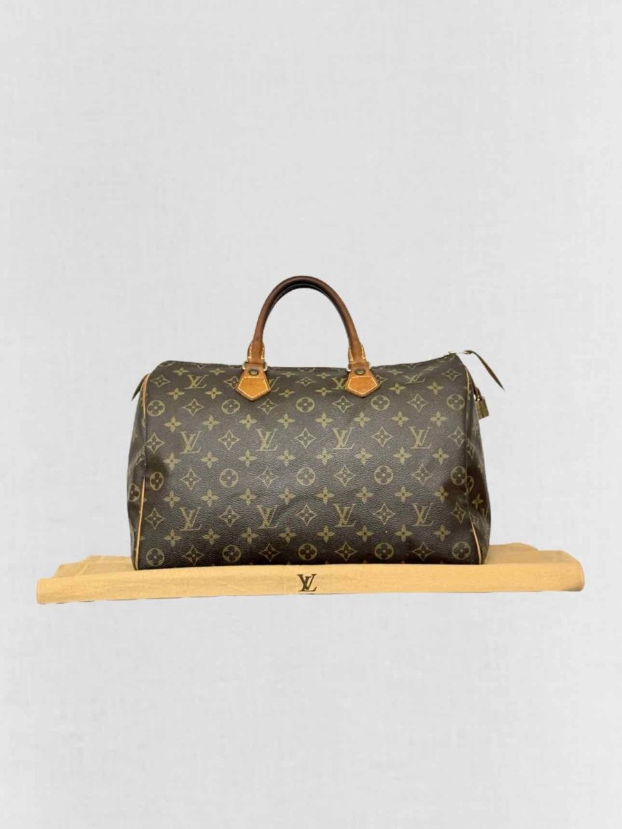 Pre - loved LOUIS VUITTON Speedy 30 Brown Monogram Top Handle at Reems Closet