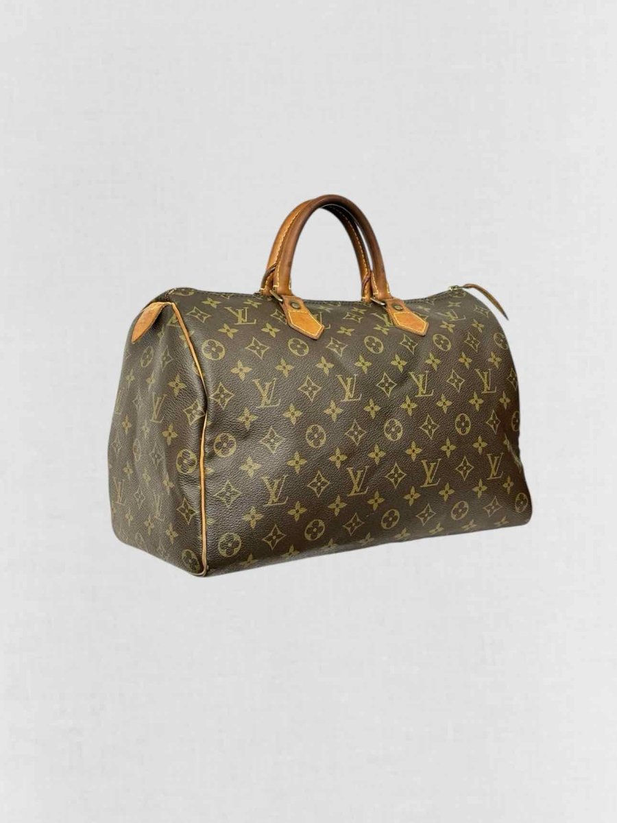 Pre - loved LOUIS VUITTON Speedy 30 Brown Monogram Top Handle at Reems Closet
