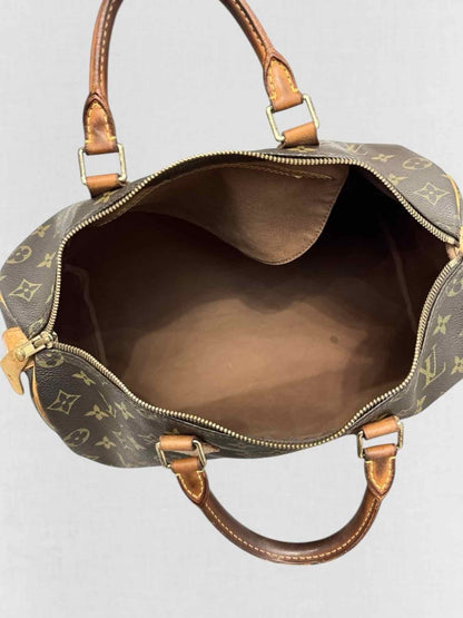 Pre - loved LOUIS VUITTON Speedy 30 Brown Monogram Top Handle at Reems Closet