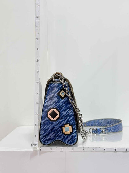 Pre - loved LOUIS VUITTON Twist Azteque Blue Multicolor Crossbody at Reems Closet