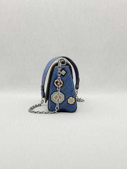 Pre - loved LOUIS VUITTON Twist Azteque Blue Multicolor Crossbody at Reems Closet