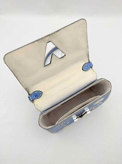 Pre - loved LOUIS VUITTON Twist Azteque Blue Multicolor Crossbody at Reems Closet