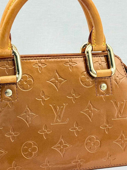 Pre - loved LOUIS VUITTON Vintage Bronze Monogram Top Handle at Reems Closet