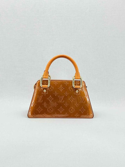 Pre - loved LOUIS VUITTON Vintage Bronze Monogram Top Handle at Reems Closet
