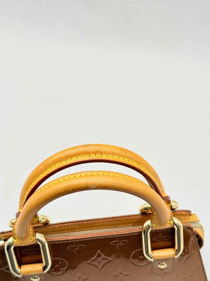 Pre - loved LOUIS VUITTON Vintage Bronze Monogram Top Handle at Reems Closet