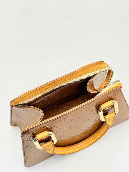 Pre - loved LOUIS VUITTON Vintage Bronze Monogram Top Handle at Reems Closet