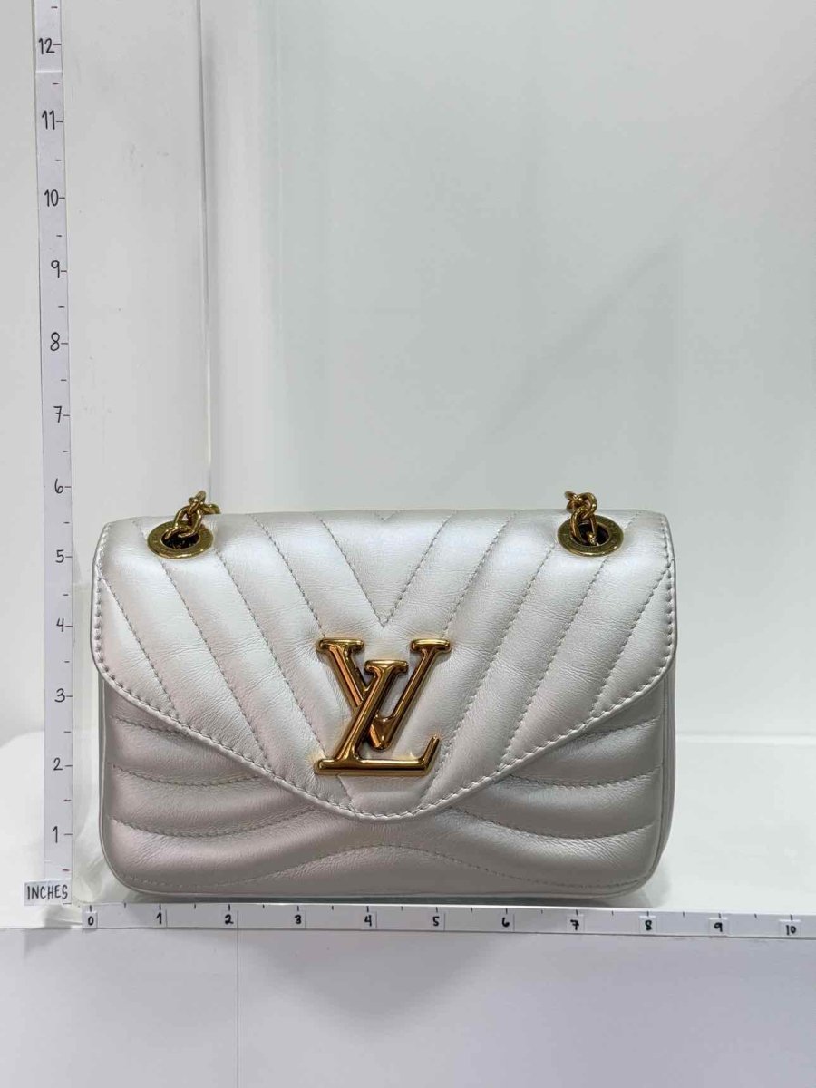Pre - loved LOUIS VUITTON Wave Silver Quilted Shoulder Bag at Reems Closet