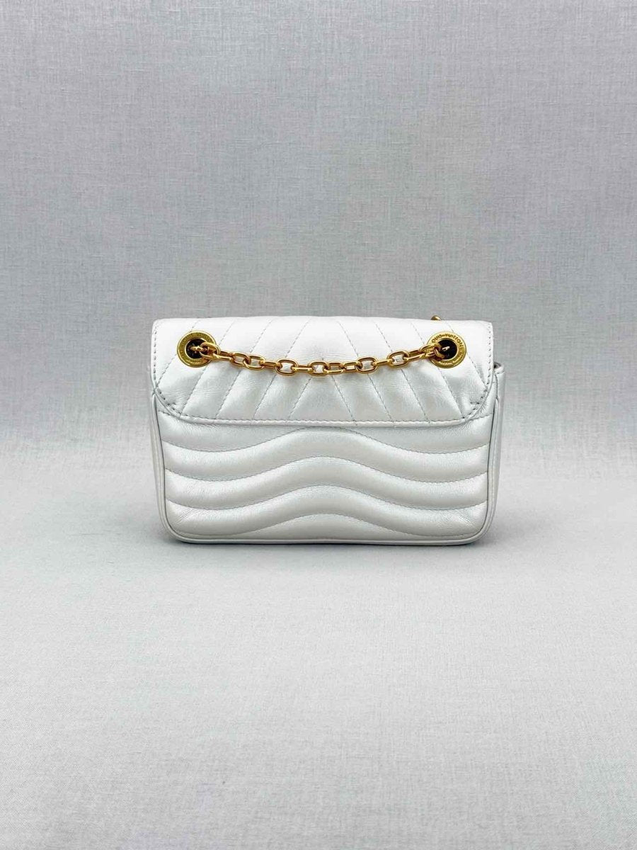 Pre - loved LOUIS VUITTON Wave Silver Quilted Shoulder Bag at Reems Closet
