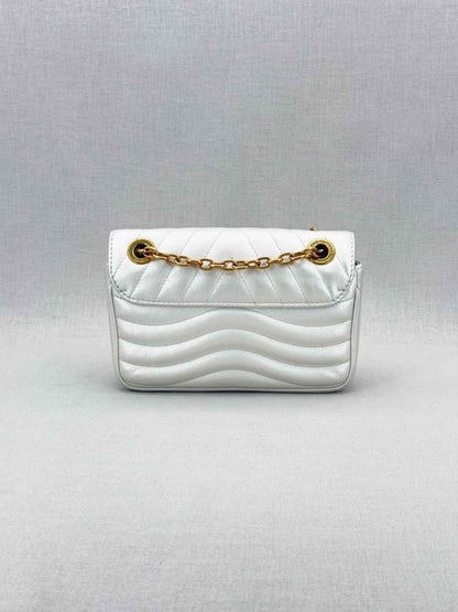 Pre - loved LOUIS VUITTON Wave Silver Quilted Shoulder Bag at Reems Closet