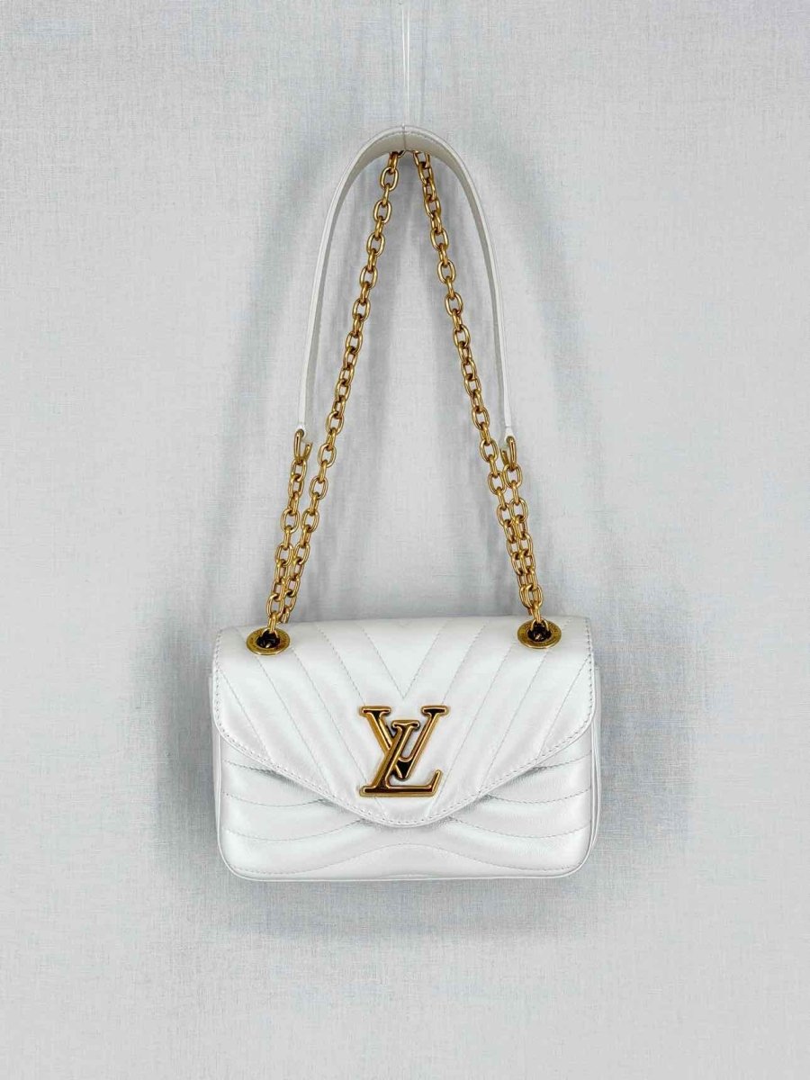 Pre - loved LOUIS VUITTON Wave Silver Quilted Shoulder Bag at Reems Closet