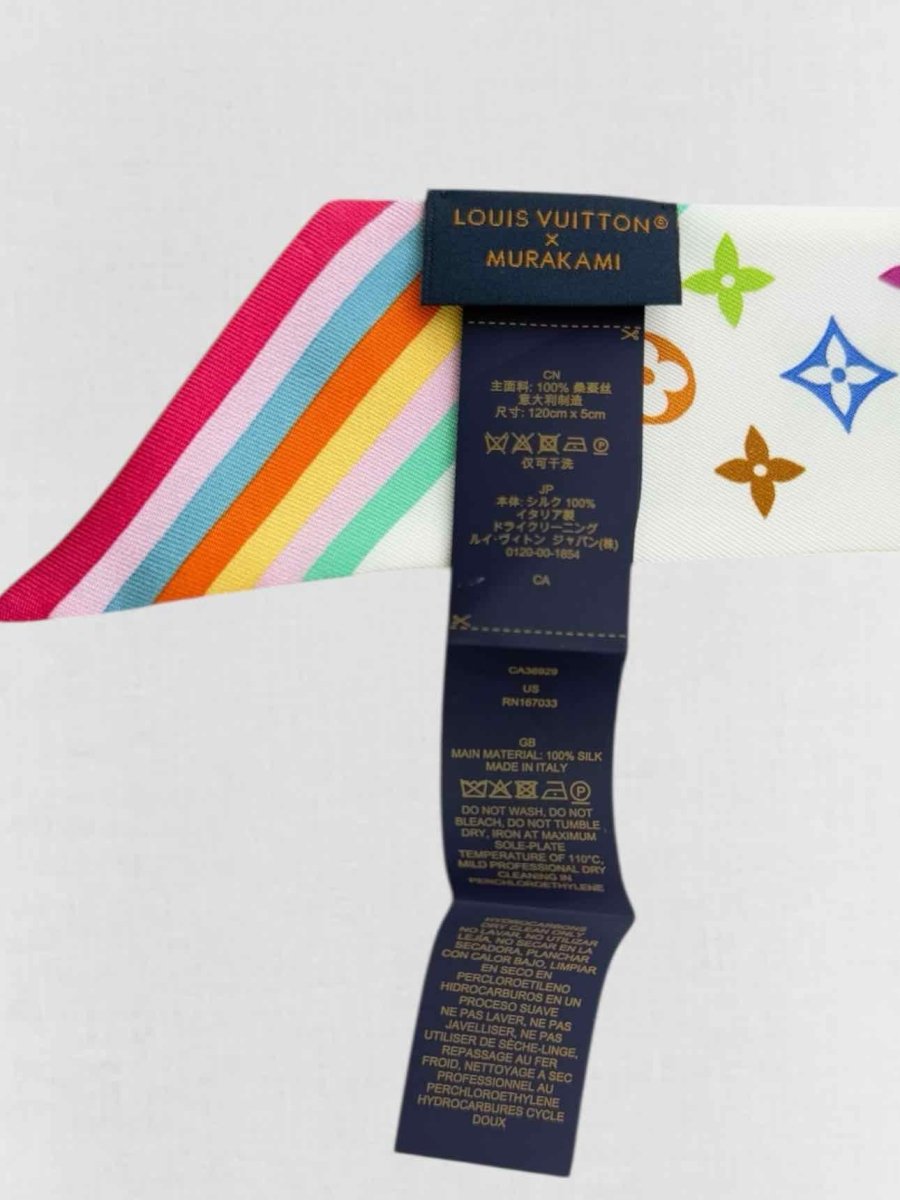 Pre - loved LOUIS VUITTON White Multicolor Monogram Twill at Reems Closet