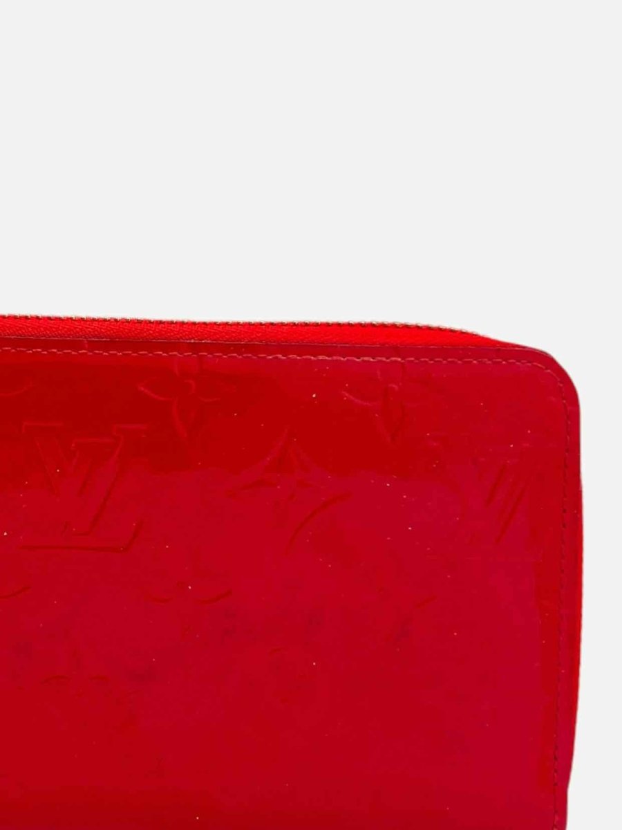 Pre - loved LOUIS VUITTON Zippy Red Continental Wallet at Reems Closet