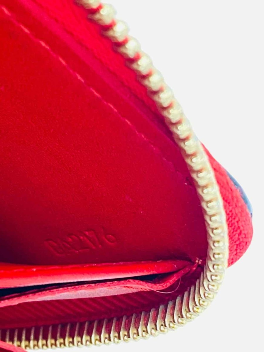 Pre - loved LOUIS VUITTON Zippy Red Continental Wallet at Reems Closet