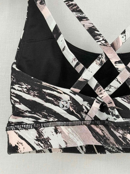 Pre-loved LULULEMON Energy Black Multicolor Splash print Bra Top at Reems Closet