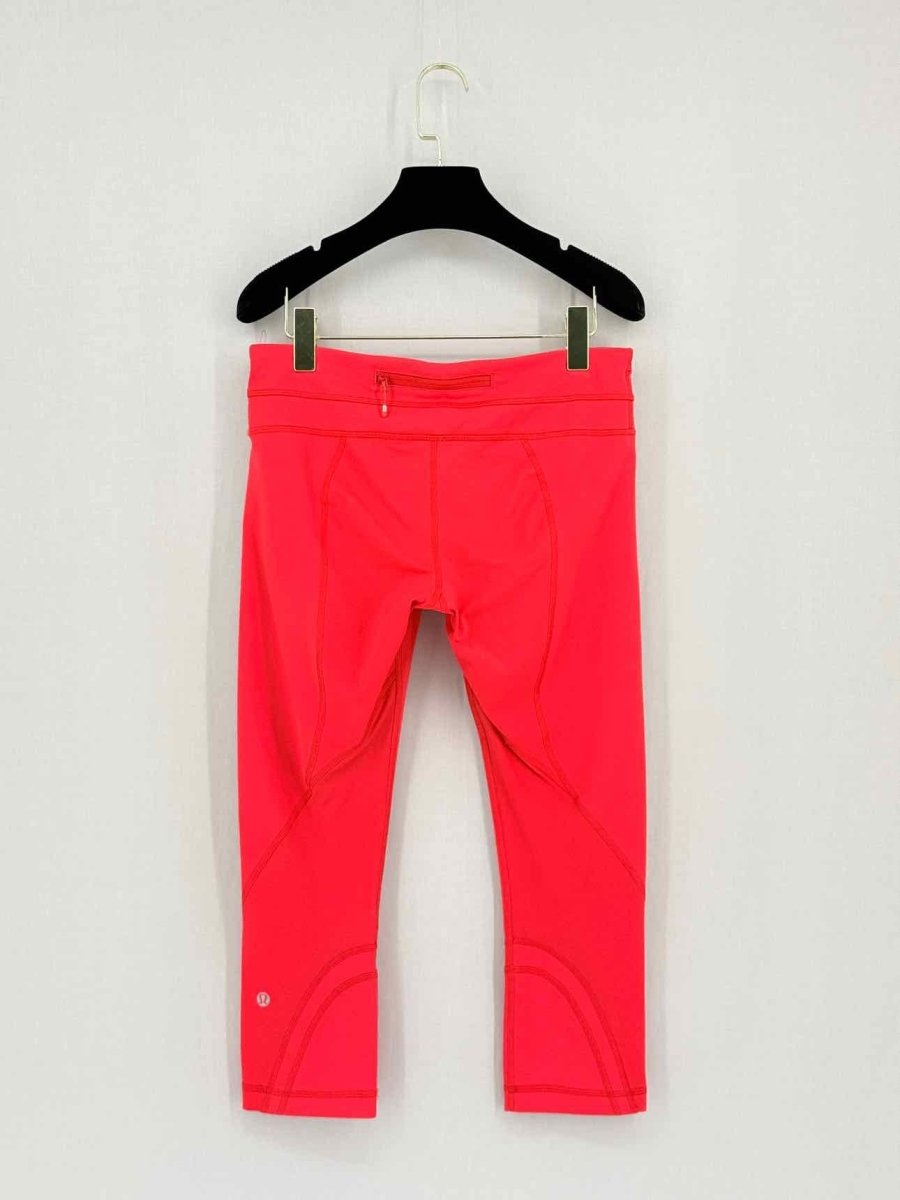 Pre - loved LULULEMON Red Orange Size Medium Leggings at Reems Closet