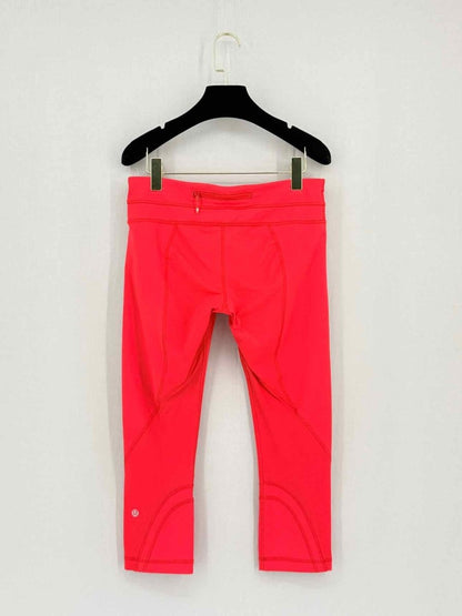 Pre - loved LULULEMON Red Orange Size Medium Leggings at Reems Closet