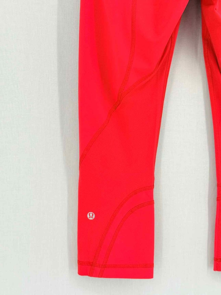 Pre - loved LULULEMON Red Orange Size Medium Leggings at Reems Closet