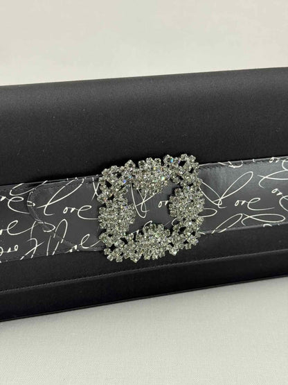 Pre - loved MANOLO BLAHNIK Envelope Black Clutch at Reems Closet