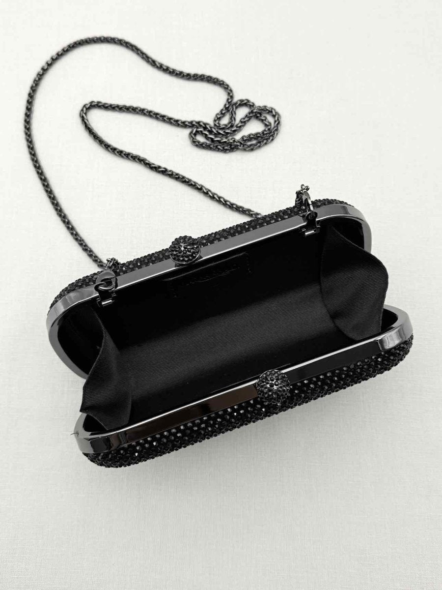 Pre-loved MARINA RINALDI Saetta Black Clutch at Reems Closet