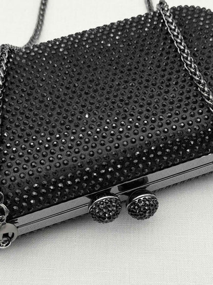 Pre-loved MARINA RINALDI Saetta Black Clutch at Reems Closet