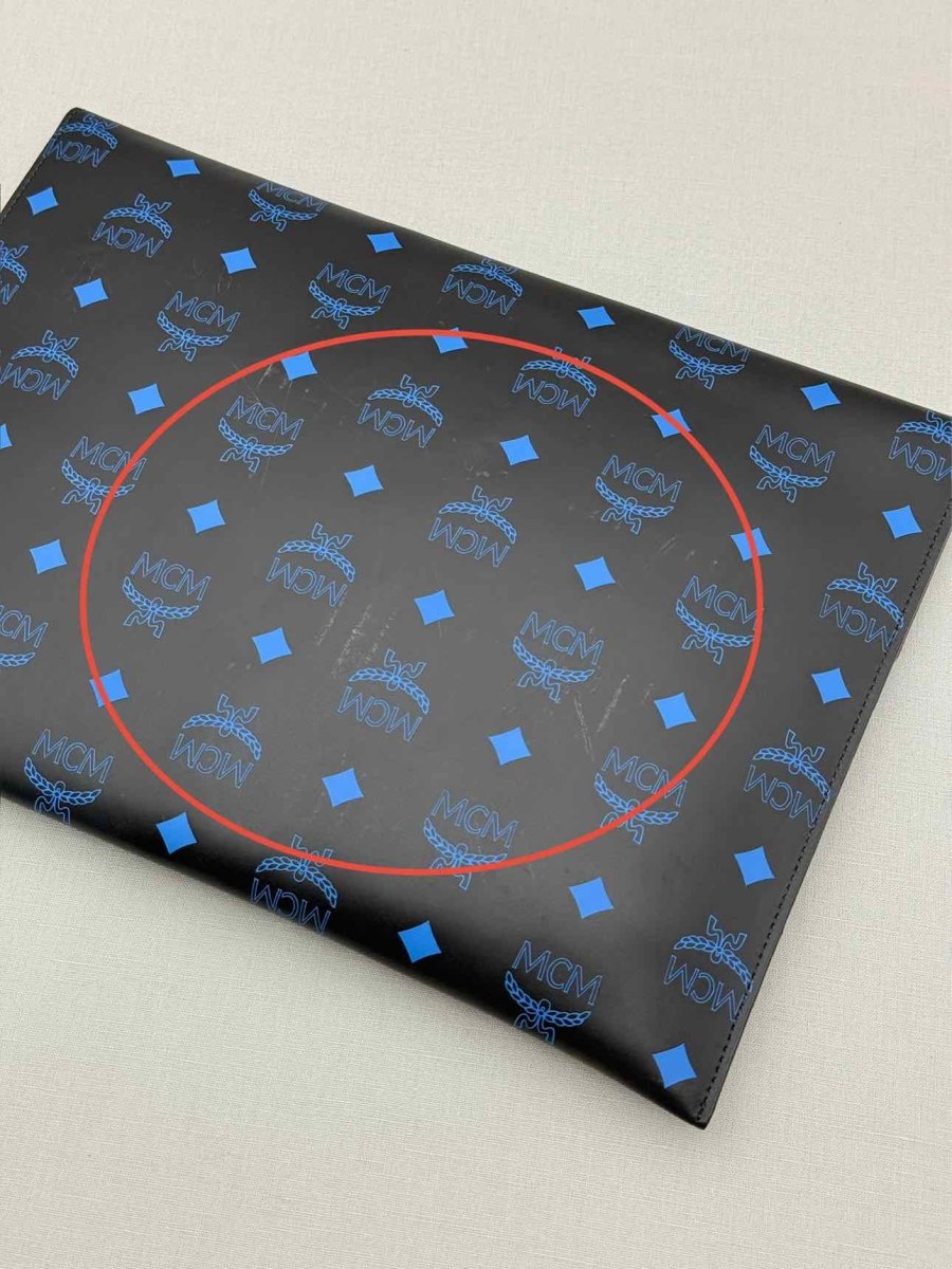 Pre-loved MCM Black & Blue Visetos Logo Print Pouch at Reems Closet