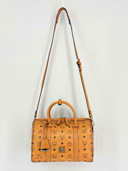 Pre-loved MCM Boston Brown Monogram Top Handle at Reems Closet