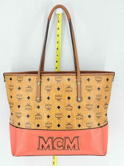 Pre - loved MCM Cognac & Orange Logo Shoulder Bag at Reems Closet