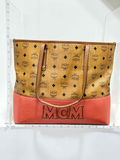 Pre - loved MCM Cognac & Orange Logo Shoulder Bag at Reems Closet