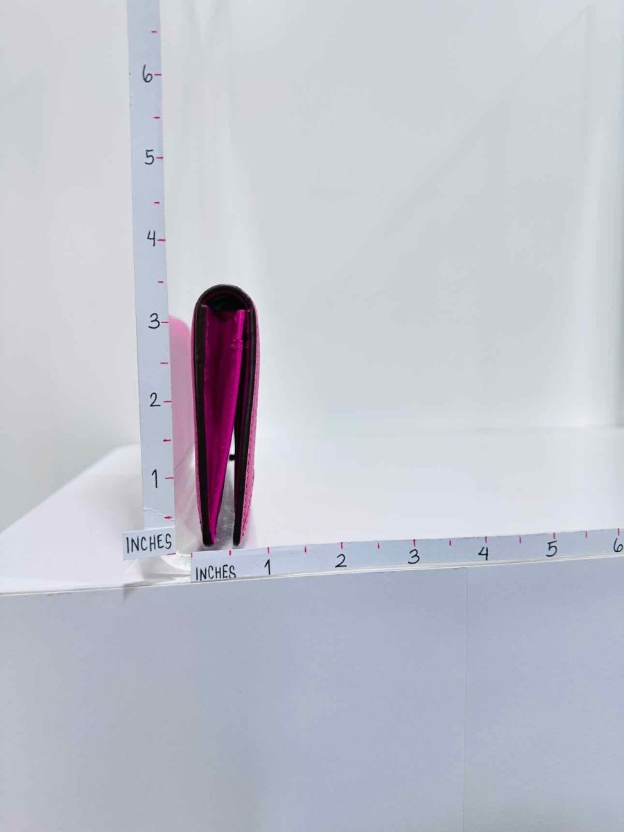 Pre - loved MCM Pink Continental Wallet at Reems Closet