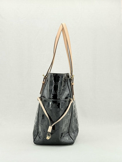 Pre - loved MICHAEL KORS Voyager Black Logo Embossed Tote Bag at Reems Closet