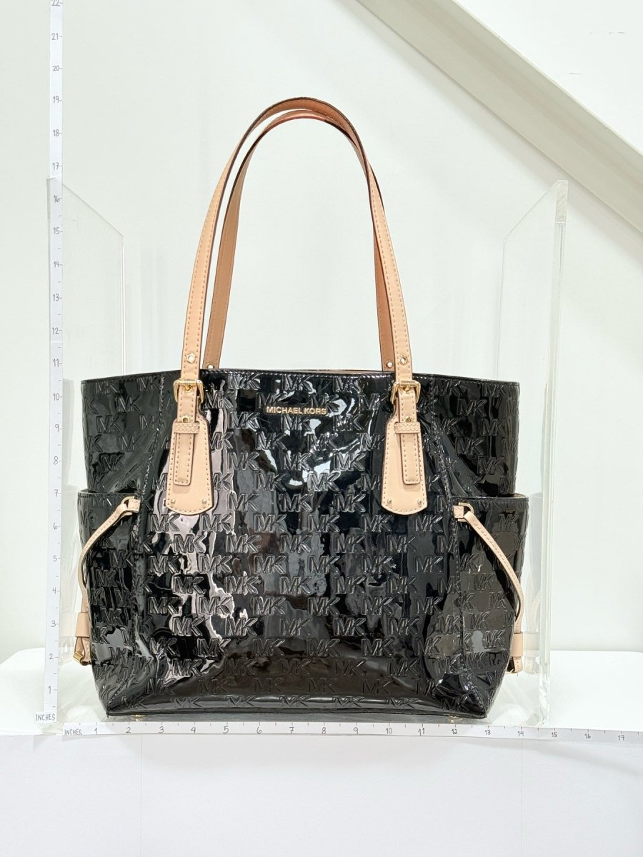 Pre - loved MICHAEL KORS Voyager Black Logo Embossed Tote Bag at Reems Closet