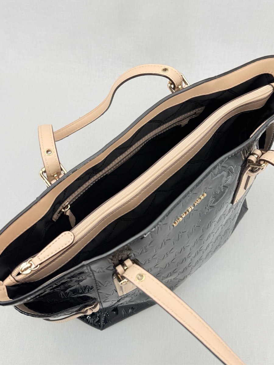 Pre - loved MICHAEL KORS Voyager Black Logo Embossed Tote Bag at Reems Closet