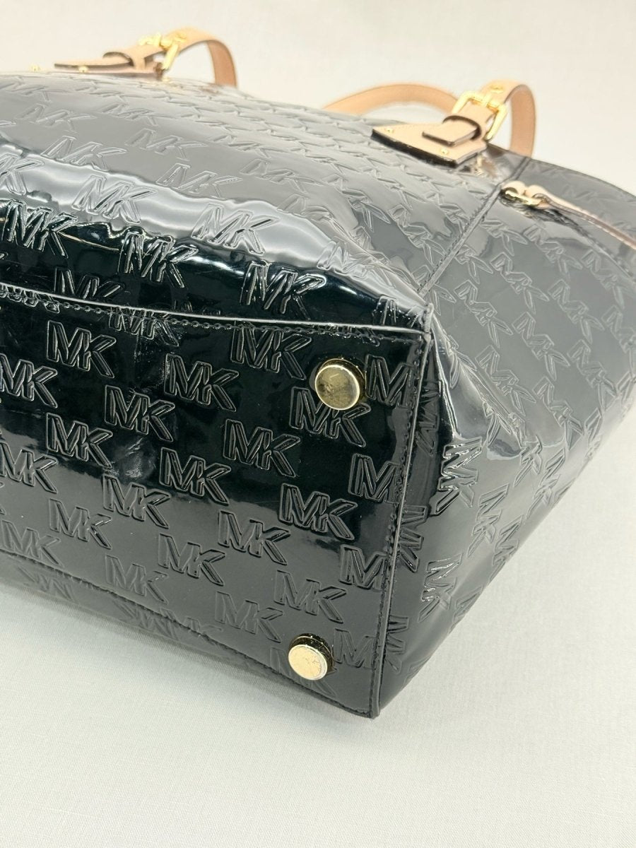 Pre - loved MICHAEL KORS Voyager Black Logo Embossed Tote Bag at Reems Closet