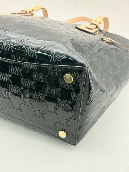Pre - loved MICHAEL KORS Voyager Black Logo Embossed Tote Bag at Reems Closet