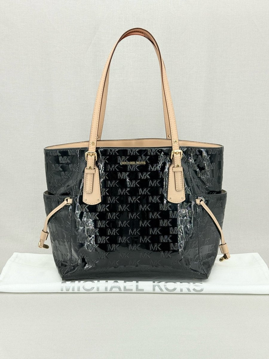 Pre - loved MICHAEL KORS Voyager Black Logo Embossed Tote Bag at Reems Closet