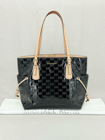 Pre - loved MICHAEL KORS Voyager Black Logo Embossed Tote Bag at Reems Closet