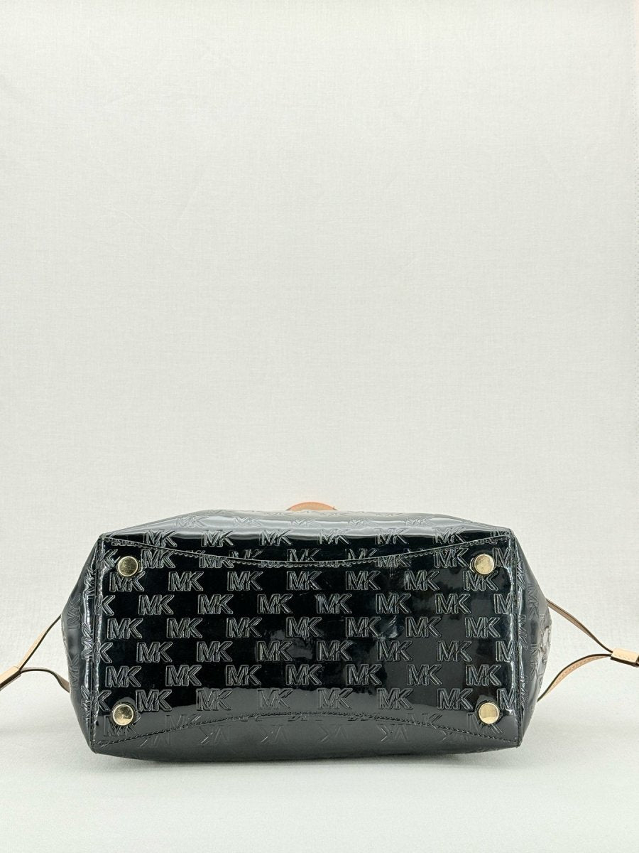 Pre - loved MICHAEL KORS Voyager Black Logo Embossed Tote Bag at Reems Closet