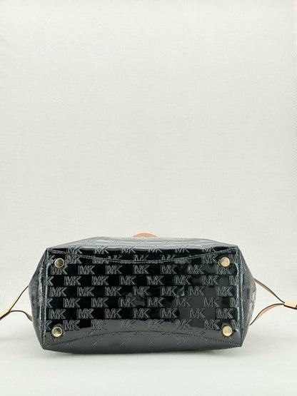 Pre - loved MICHAEL KORS Voyager Black Logo Embossed Tote Bag at Reems Closet